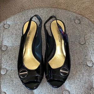 Black patent peep toe shoes